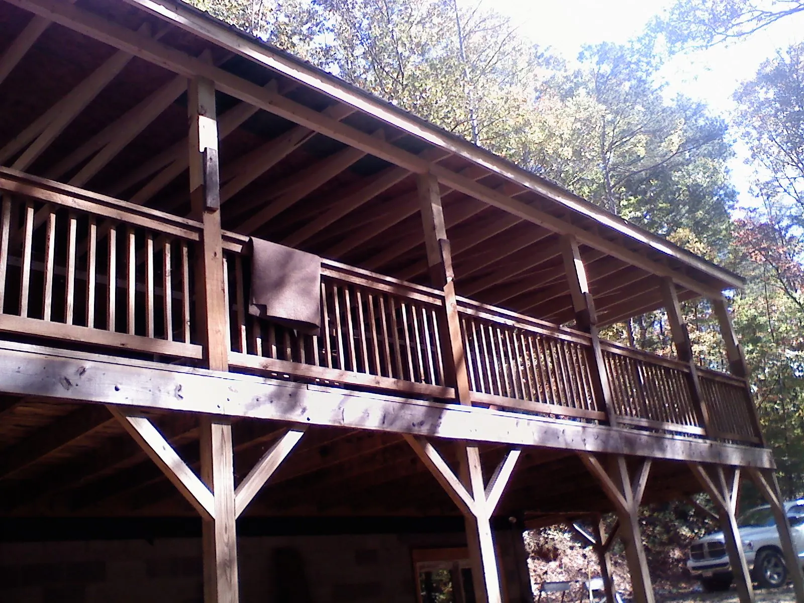Timber framing under a new elevated porch and deck — Roof Leak Repair in Corunna by Roofing Brothers